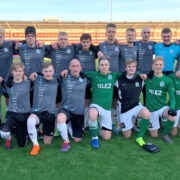 Võidukas FC Hiiumaa Sportland Arenal, tagareas paremal peatreener Mario Degtjov.